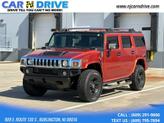 Photo of 2003 Sunset Orange Metallic Hummer H2