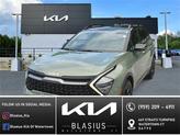 Photo of 2023 Jungle Green/Ebony Black Roof Kia Sportage