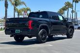 Thumbnail of 2025 Midnight Black Metallic Toyota Tundra