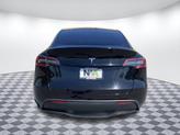 Thumbnail of 2023 Solid Black Tesla Model Y