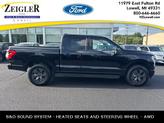 Photo of 2025 Agate Black Metallic Ford F-150 Lightning