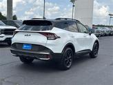 Thumbnail of 2023 Glacier White Pearl Kia Sportage