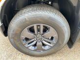 Thumbnail of 2025 Glacier White Nissan Frontier