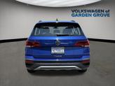 Thumbnail of 2023 Dusk Blue Metallic Volkswagen Taos