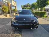 Thumbnail of 2021 Jet Black BMW 330e