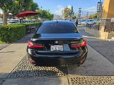Thumbnail of 2021 Jet Black BMW 330e