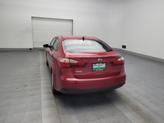 Thumbnail of 2016 Crimson Red Metallic Kia Forte