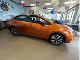 Thumbnail of 2021 Monarch Orange Pearl Met Nissan Versa