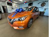 Thumbnail of 2021 Monarch Orange Pearl Met Nissan Versa