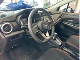 Thumbnail of 2021 Monarch Orange Pearl Met Nissan Versa