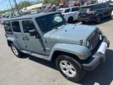 Thumbnail of 2014 gray granite Jeep Wrangler Unlimited
