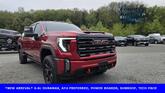 Photo of 2024 Volcanic Red Tintcoat GMC Sierra 2500