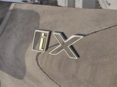Thumbnail of 2025 Black Sapphire Metallic BMW iX