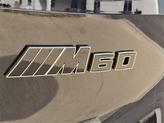 Thumbnail of 2025 Black Sapphire Metallic BMW iX