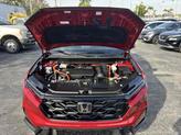 Thumbnail of 2023 Radiant Red Metallic Honda CR-V Hybrid