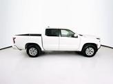 Thumbnail of 2023 Glacier White Nissan Frontier