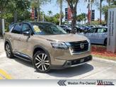 Photo of 2024 2t Tan Blk Roof Nissan Pathfinder