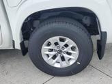 Thumbnail of 2026 Glacier White Nissan Frontier
