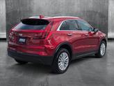Thumbnail of 2024 Radiant Red Tintcoat Cadillac XT4