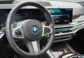 Thumbnail of 2025 Carbon Black Metallic BMW X5 PHEV