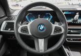Thumbnail of 2025 Carbon Black Metallic BMW X5 PHEV