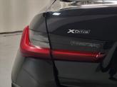 Thumbnail of 2024 Black BMW 330