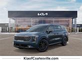 Photo of 2025 Astra Blue Kia Carnival Hybrid