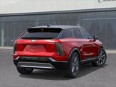 Thumbnail of 2025 Radiant Red Tintcoat Cadillac OPTIQ