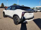 Thumbnail of 2025 Aspen White Tricoat/Super Black Nissan Kicks