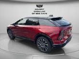 Thumbnail of 2025 Radiant Red Tintcoat Cadillac OPTIQ