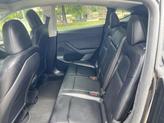 Thumbnail of 2023 Solid Black Tesla Model Y