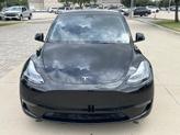 Thumbnail of 2023 Solid Black Tesla Model Y