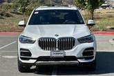 Thumbnail of 2023 Mineral White Metallic BMW X5 PHEV