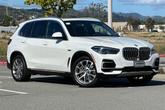 Thumbnail of 2023 Mineral White Metallic BMW X5 PHEV