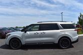 Thumbnail of 2025 Ivory Silver Kia Carnival Hybrid