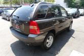Thumbnail of 2006 Smokey Brown Kia Sportage