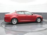 Thumbnail of 2014 Remington Red Metallic Kia Optima