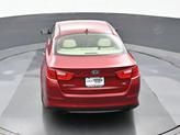 Thumbnail of 2014 Remington Red Metallic Kia Optima