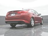 Thumbnail of 2014 Remington Red Metallic Kia Optima