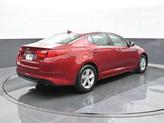 Thumbnail of 2014 Remington Red Metallic Kia Optima