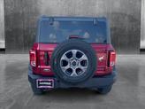 Thumbnail of 2025 Ruby Red Metallic Tinted Clearcoat Ford Bronco