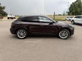 Thumbnail of 2023 Copper Ruby Metallic Porsche Macan