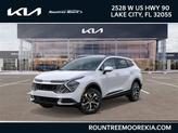 Photo of 2025 White Pearl Kia Sportage Hybrid