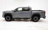 Thumbnail of 2023 Boulder Gray Pearl Nissan Frontier