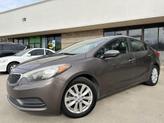 Photo of 2014 Metallic Bronze Kia Forte