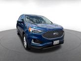 Thumbnail of 2024 Atlas Blue Metallic Ford Edge