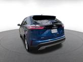 Thumbnail of 2024 Atlas Blue Metallic Ford Edge