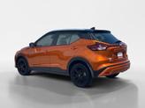 Thumbnail of 2023 Monarch Orange Metallic/Super Black Nissan Kicks