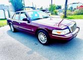 Photo of 2009 maroon Mercury Grand Marquis