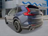 Thumbnail of 2026 Canyon River Blue Metallic Honda CR-V Hybrid